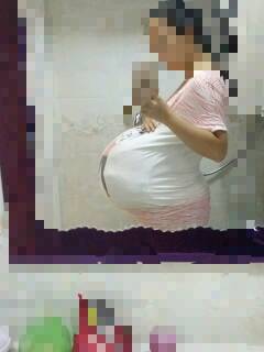 怀孕7个月,肚子特别大,比较下怀,肚子坠的难受